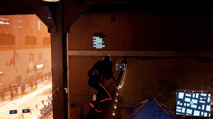 The second capsule is located under the bridge in the southern part of the district - Spider-Man Miles Morales: Time capsules - all locations, list - Collectibles - Spider-Man Miles Morales Guide